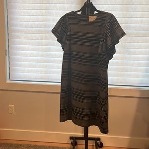 Excellent condition, black and white dress with flutter sleeve